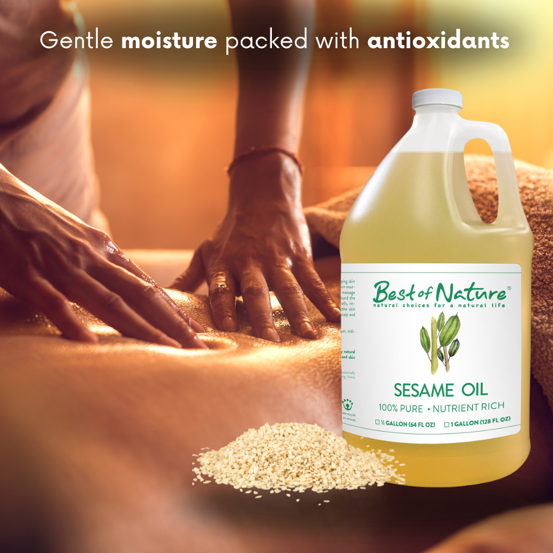 Bottle of Best of Nature Sesame Oil with hands applying oil to skin and sesame seeds on a blurred background.