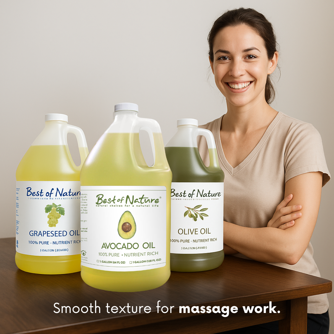 Massage therapist standing behind three bottles of &#39;Best of Nature&#39; body oils on a wooden table.